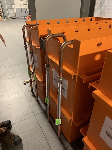 Orange DUG cooling tanks being installed in Houston
