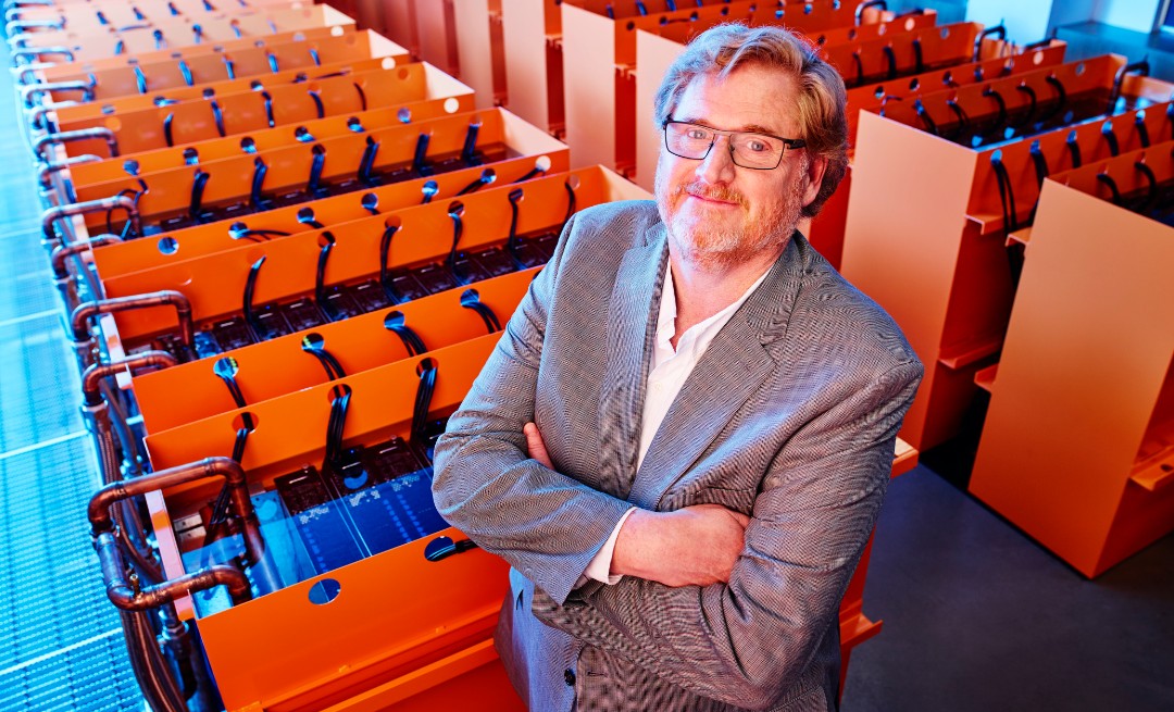 Dr Matthew Lamont with supercomputer Bruce